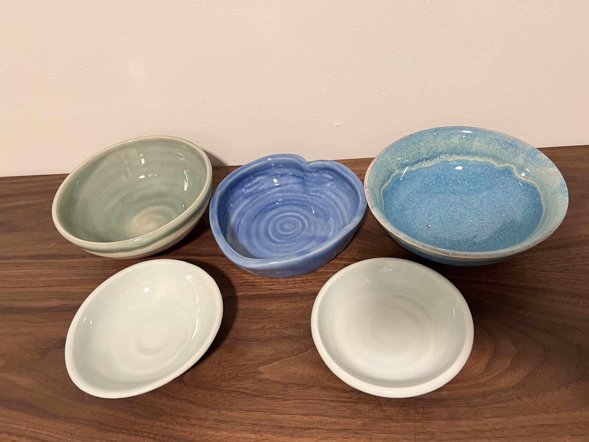 A small set of wheel-thrown pottery bowls